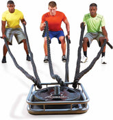 Three men perform pull-ups using a rope, showcasing strength and teamwork in a fitness setting.